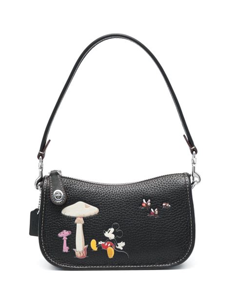 disney coach swinger bag 20.